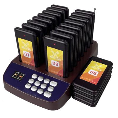 China Mini Beeper Wireless Coaster Guest Calls Pager Waiter Customer Service Vibrating Call Bell Table for Queue and Restaurant Pager System for sale