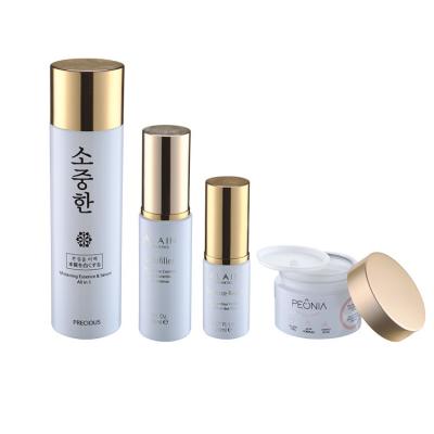 China Personal Care Opal Glass Cap Bottle Skin Care Lotion Toner Cream Glass Empty Cosmetic White Aluminum Bottle for sale