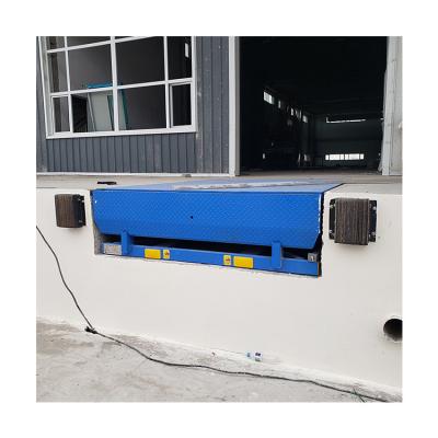 China Building Material Shops Best Price 6t Dock Ramp Hydraulic Cylinder Stationary Hydraulic Fixed Dock Leveler Boarding Bridge for sale