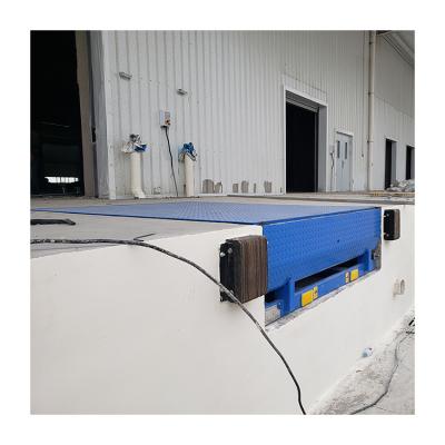 China Building Material Stores Platform Storage Cold Chain Equipment Hydraulic Fixed Bridge Yard Unloading Loading Ramp for sale