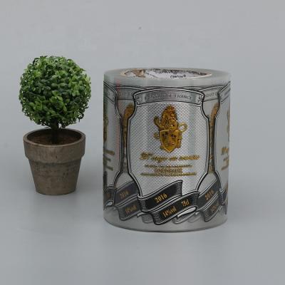 China Waterproof Custom Printing Metal Embossing Gold Foil Hot Stamping Wine Bottle Sticker Embossed Labels for sale