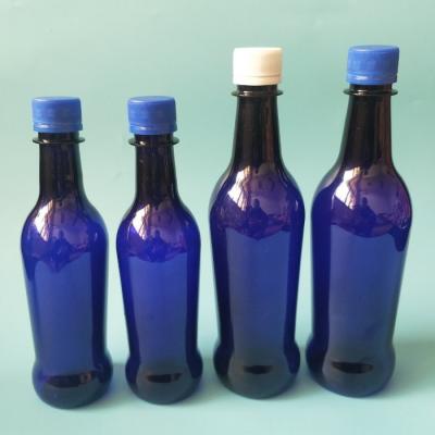 China Unique Design 330ml 500ml Pet Bottle Color Package Pet Blue Plastic Juice Beverage Bottle Drinking Amber Clear Beer Bottle for sale