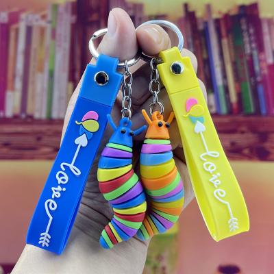 China 2023 accessories rubber carpenterworm key chain cartoon backpack llavero decompression toys wholesale for sale