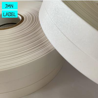 China Sustainable Hot Sale Single Sided Pearl Coated White Polyester Taffeta Flat Ribbon For Apparel Label for sale