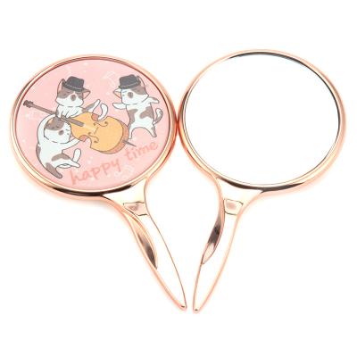 China Rose Gold Handheld Plastic Round Compact Makeup Mirror Magnifying Mirror Accept Customization Handle Mirror for sale