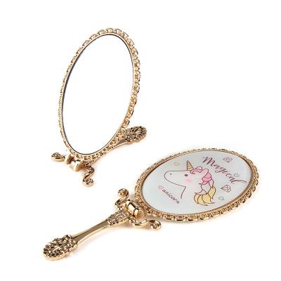 China Gold Unicorn Magnifying Pattern Printing Top Selling Foldable Wholesale Cosmetic Mirror Hand Mirror Custom Compact Pocket Mirror for sale