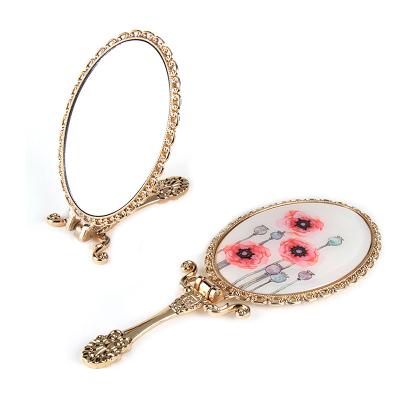 China Light Magnifying Gold Rose Gold Plating Hand Mirror Vintage Mirror Pocket Mirror Zinc Alloy Custom Luxury Compact Compact for sale