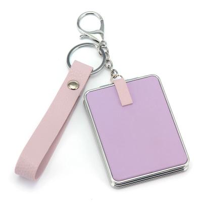 China PU Magnifying Ladies Compact Empty White Leather PU Mirror Pocket Key Chain Mirror for sale