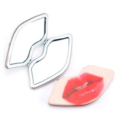 China Sexy Pocket Mirror Handheld Mirror Lip Shape Magnifying Compact Mirror for sale