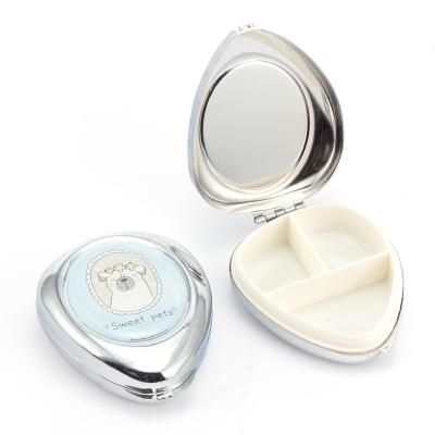 China Silver Plating Storage Portable Small Egg Shape Container Medicine Case Capsule 60mm Metal Pill Box Organizer Travel With Mirro for sale