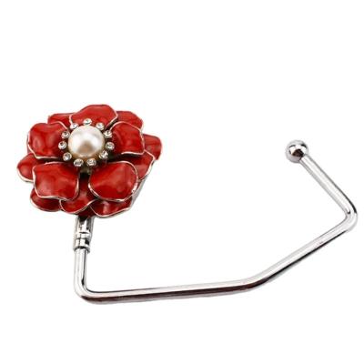 China Portable Metal Flower Bag Hanger Table Handbag Holder Purse Hook Folding Table Hook for Women Gifts for sale