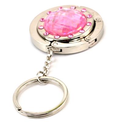 China Metal Magnetic Folding Bag Purse Hook Handbag Key Chain Hanger Holder Crystal Decoration for sale