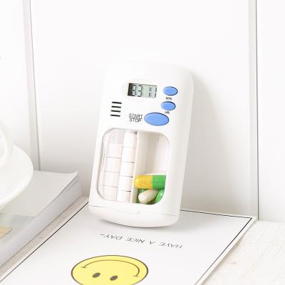 China Viable Storage Portable Medicine Dispenser Reminder Timer Smart Pill Box for sale