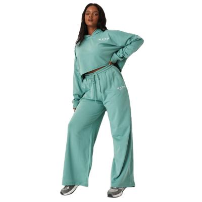 China Custom Made Light Blue Breathable Cotton Tracksuit Women Jogging Suit Crop Top Jogging Two Piece Set Suit for sale