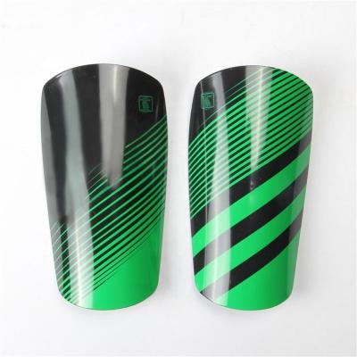 China Custom Made PU Carbon Fiber Shin Pads Leg Guards Soccer Guards Protective Gear for sale