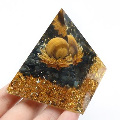 China Pyramids Natural Meditation Energy Orgonite Chakra Seat Lotus Eye Orgone Pyramid Orgone Pyramid Tiger Spiritual Crystal Pyramid for sale