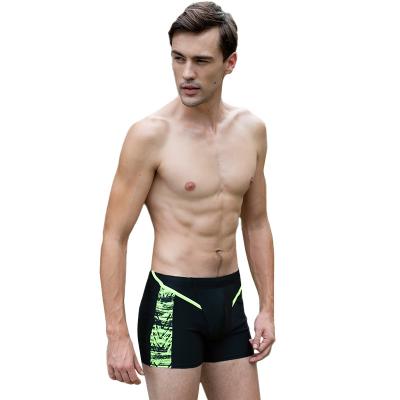 China Customized Elastic Mens Beach Shorts Hot Selling Swimming Trunks Mens Swimwear for sale