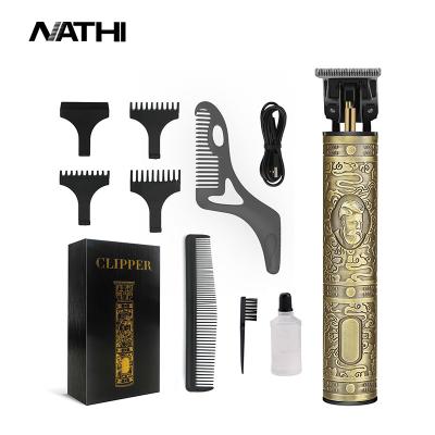 China 2 Colors Choice Small Portable Hair Trimmer Skulls Designs Embossing Clippers Men Tools Electric Clipper USB Charger Top Clipper for sale