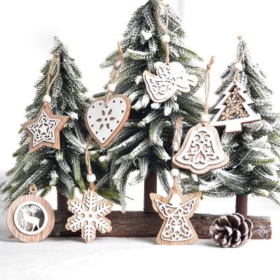 China Woodiness Christmas Decorations Wooden Laser Hollowed Double Pendant White Christmas Tree Snowflake Pendant for sale