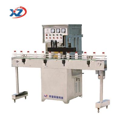 China Food Rubbing Cover Machine Bottle Filling Capper Capping Machine for sale