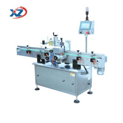 China Round Food Bottle Fixed Point Vertical Labeling Machine for sale