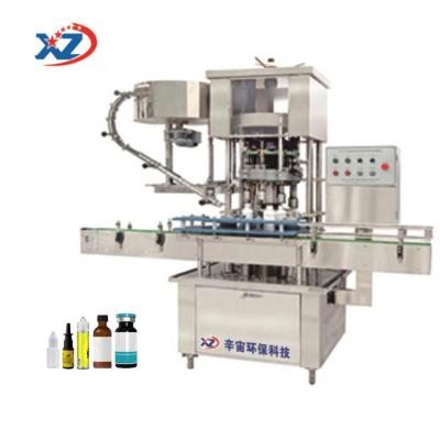 China Food Capping Machine XG-1B Automatic Capping Screwing Machine for sale