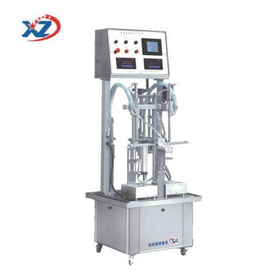 China Food Double Heads Liquid Filling And Weighting Machine for sale