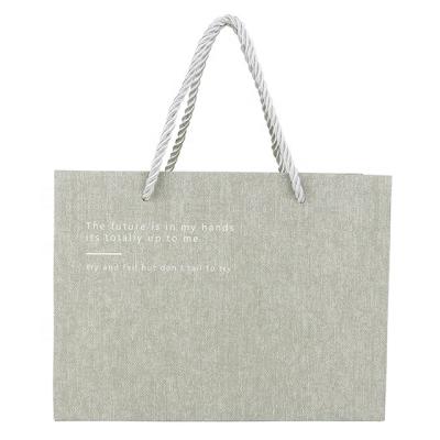 China OEM/ODM Recyclable Paper Shopping Tote Simulation Linen Paperboard Customize Luxury Custom Gift Bags for sale