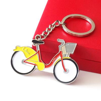 China Wholesale custom yellow metal 3D soft effect enamel logo bike promotion bicycle key chain keychains with your logo for sale