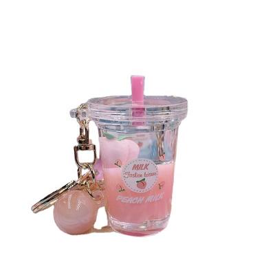 China Souivire Boba Quicksand Kawaii Animal Liquid Bubble Bottles Milk Key Chain Keychains Tea for sale