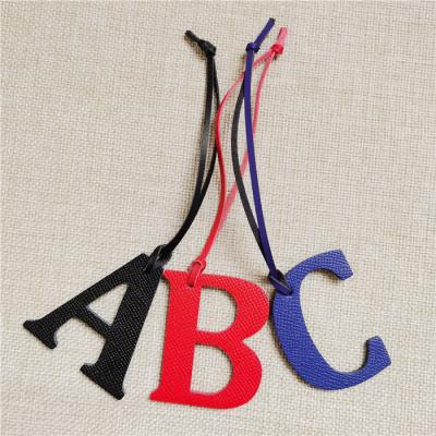 China Hot Sales Genuine Leather ABC Letters Pendant For Women Handbag Charm Key Chain Accessories for sale