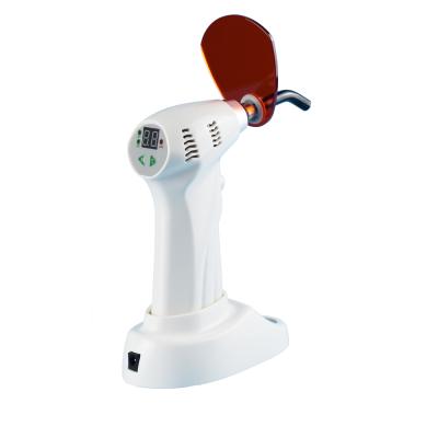 China Dental Clinic Amber Wireless Gun Type Dental LED Curing Light for sale