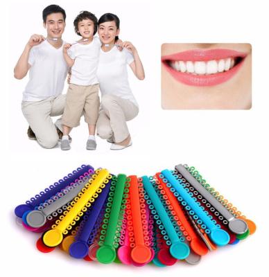 China Dental Clinic Glow in the Dark Dental Orthodontic Elastic Ligature Bond for sale