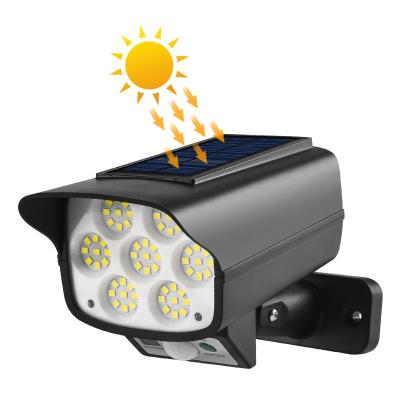 China Easy Installation Hot Selling Amazon Simulation Surveillance Spot Light Solar Collector Outdoor Waterproof Wall Light for sale