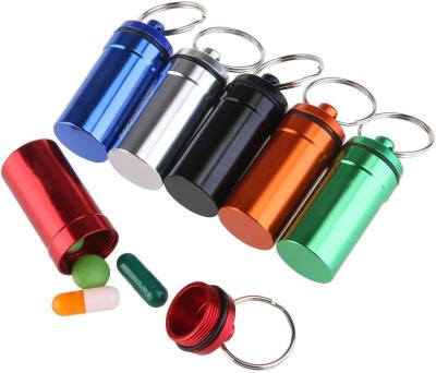 China Outdoor Aluminum Waterproof Portable Pill Box Container Waterproof Smell Proof Capsule Pill Box Metal Key Chain Key Chain for sale