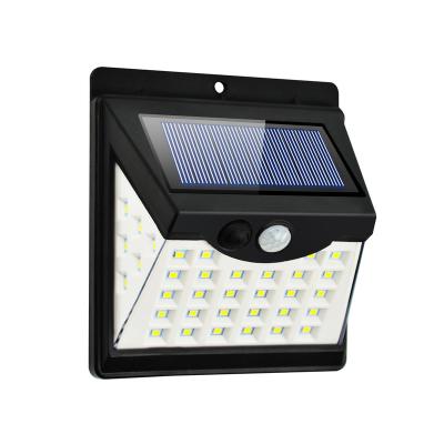 China Solar Power Lighting 4W Outdoor Radio Security Outdoor Solar Wall Light With Auto Adjusting Working Modes IP65 Waterproof Led Solar Wall Lamp for sale