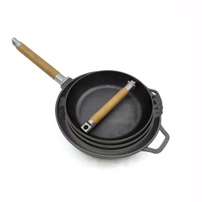 China Minimalist 9.45 Inch Round Cast Iron Non Stick Skillet With Detachable Heat Resistant Wooden Handle for sale