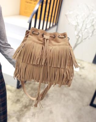 China Fashion/daily use 2022 new retro European and American simple tassel drawstring bucket bags tassel single shoulder slope female bag for sale