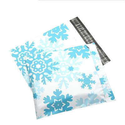 China Carrying In Stock Snowflake Christmas Thickened Apparel Shipping Papers Shipping Bags for sale