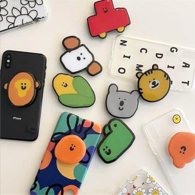 China Wholesale Adjustable Acrylic Mobile Phone Stand Cute Design Phone Grip Phone Grip With Custom Logo for sale