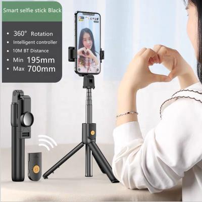 China Aluminum Alloy Foldable Retractable Mode 360 ​​Degree Rotation Mini Wireless Selfie Stick Smartphone Tripod for sale