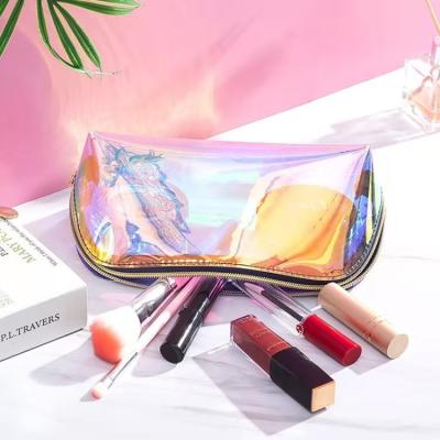 China Durable high-end outdoor portable custom made women's tpu travel bag storage print pocket makeup pouch girl's cosmetic bag PVC for sale