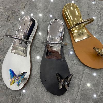 China Unique luxury ankle strap women's fashion trend DM butterfly flat sandals for ladies and women for sale