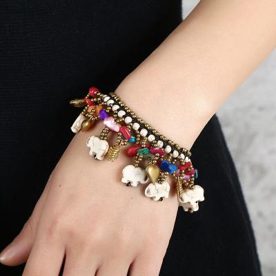 China CLASSIC Bohemian Handmade Thai Wax Thread Bracelet Elephant Copper Stone Beaded Colorful Pine Bracelet for sale