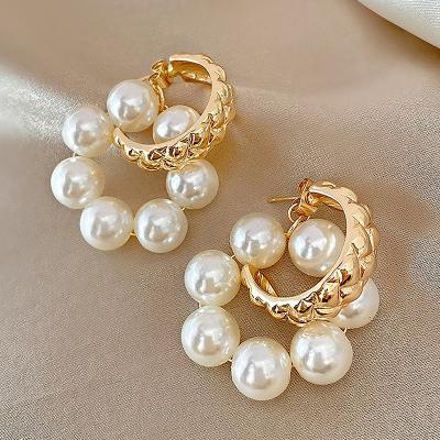 China 925 FASHIONABLE Bohemian Hoop Earrings Needle Pearl Retro Silver C-Shaped Huggie Earrings For Women for sale