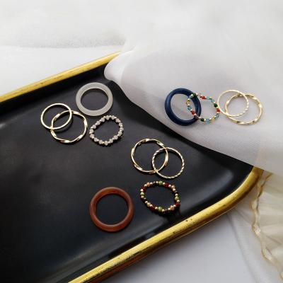 China FASHIONABLE Female Bohemian Jewelry Rings Alloy Index Ring Personality Four-Piece Resin Ring Set for sale