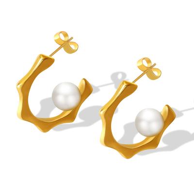 China Simple and flexible vintage c-shaped temperament earrings, luxury gold-plated high niche design texture imitation pearl earrings for sale