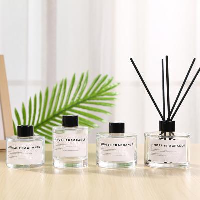 China 200ml Aromatherapy Bottle Cosmetic Decorative Round Shaped Clear Reed Car Room Diffuser Glass Bottle With Cap for sale