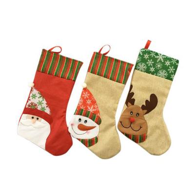 China Seasonal Felt Gifts Factory Candy Gift Stocking Santa Decoration Fleece Christmas Stocking for sale