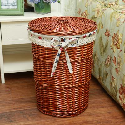 China Natural Handmade Rattan Rattan Laundry Basket Traditional Handwoven Storage Baskets Laundry Basket With Lid for sale